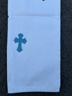 Light blue pants with dark blue cross motif on front of leg