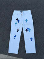 Light blue pants with navy cross print, front view, button fly