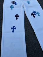 Light blue pants with navy cross print, side view of legs