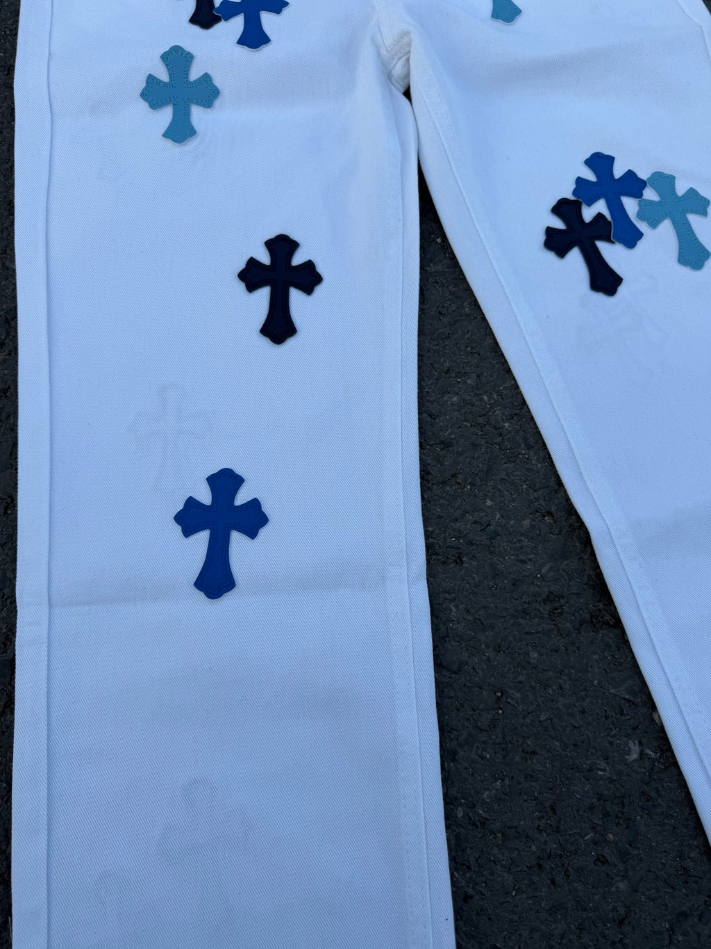 Light blue pants with scattered dark blue cross patterns on both legs