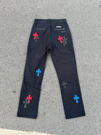 Dark gray straight-leg pants with colorful cross patches and back pocket details