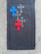 Denim pants with blue, gray, and red cross patches, straight leg