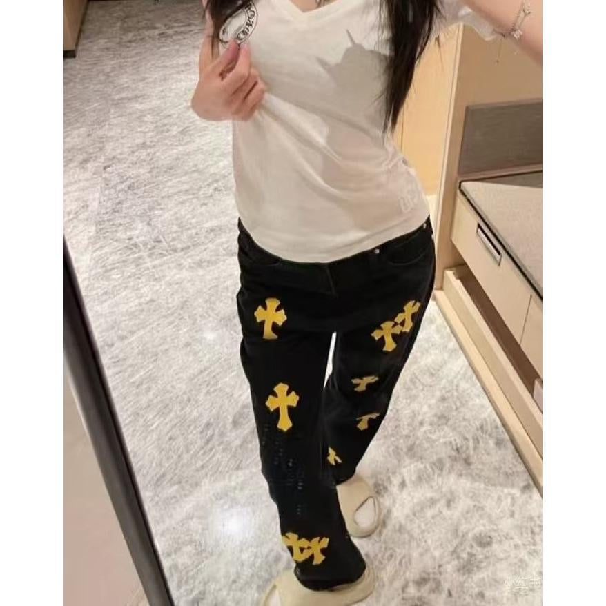 Black pants with gold cross pattern, slim fit