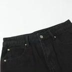 Black denim pants waistband with button and logo patch