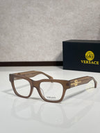 Versace eyeglasses with brown frame and gold Medusa emblem on the temple, clear lenses