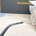 Balenciaga glasses close-up of dark blue temple with printed model details