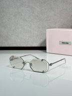 Miu Miu octagonal sunglasses, silver frame with clear lenses