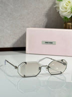Miu Miu octagonal eyeglasses, silver frame with clear lenses