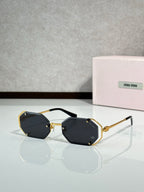 Miu Miu octagonal sunglasses, gold frame with dark lenses