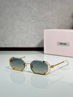 Miu Miu octagonal sunglasses, gold frame with dark lenses