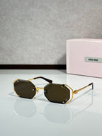 Miu Miu octagonal sunglasses, gold frame with dark lenses