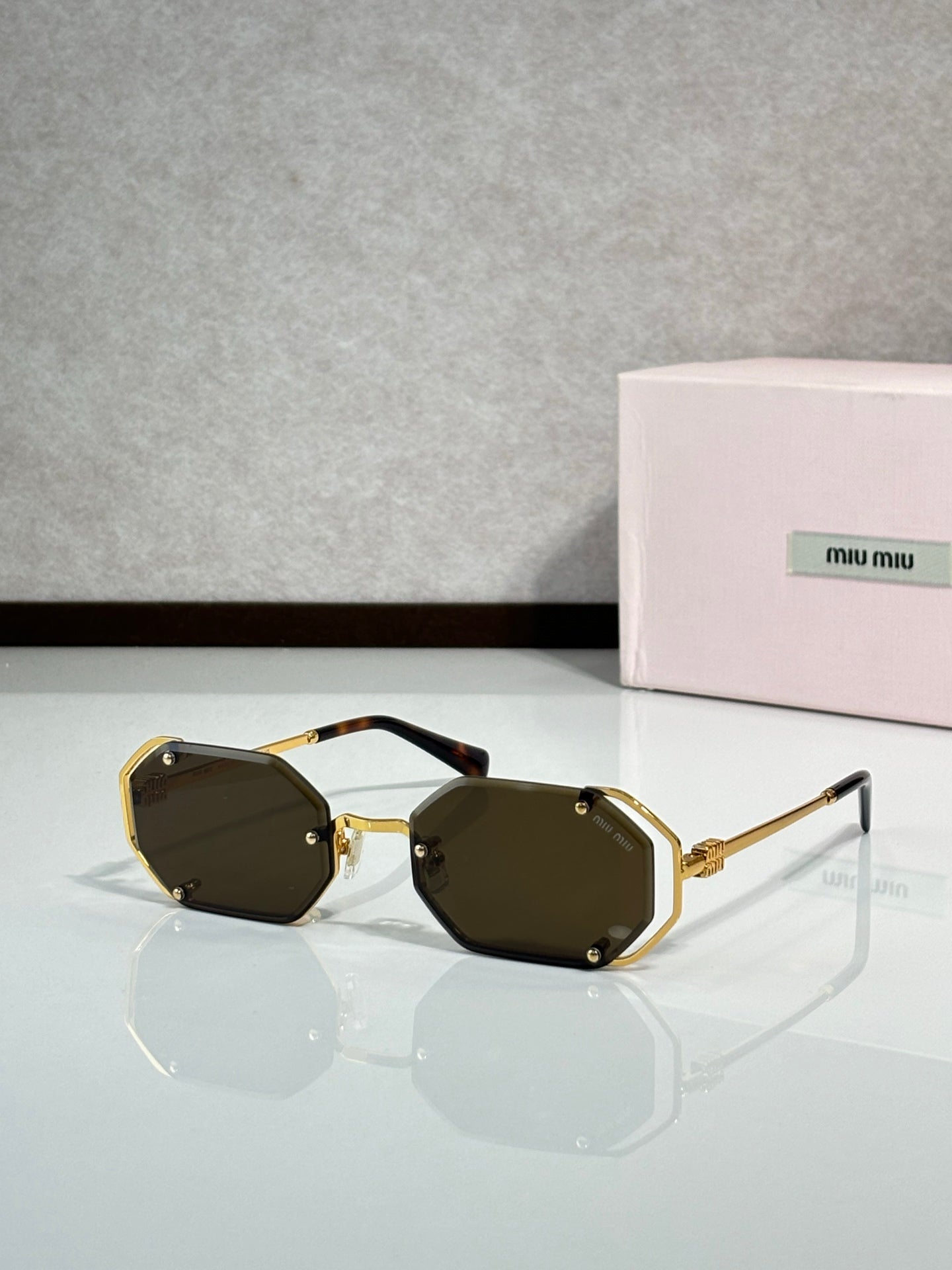 MiuMiu Glasses