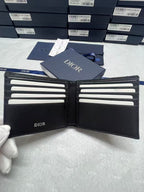 Small bag wallet with Dior logo, bi-fold design and card slots.