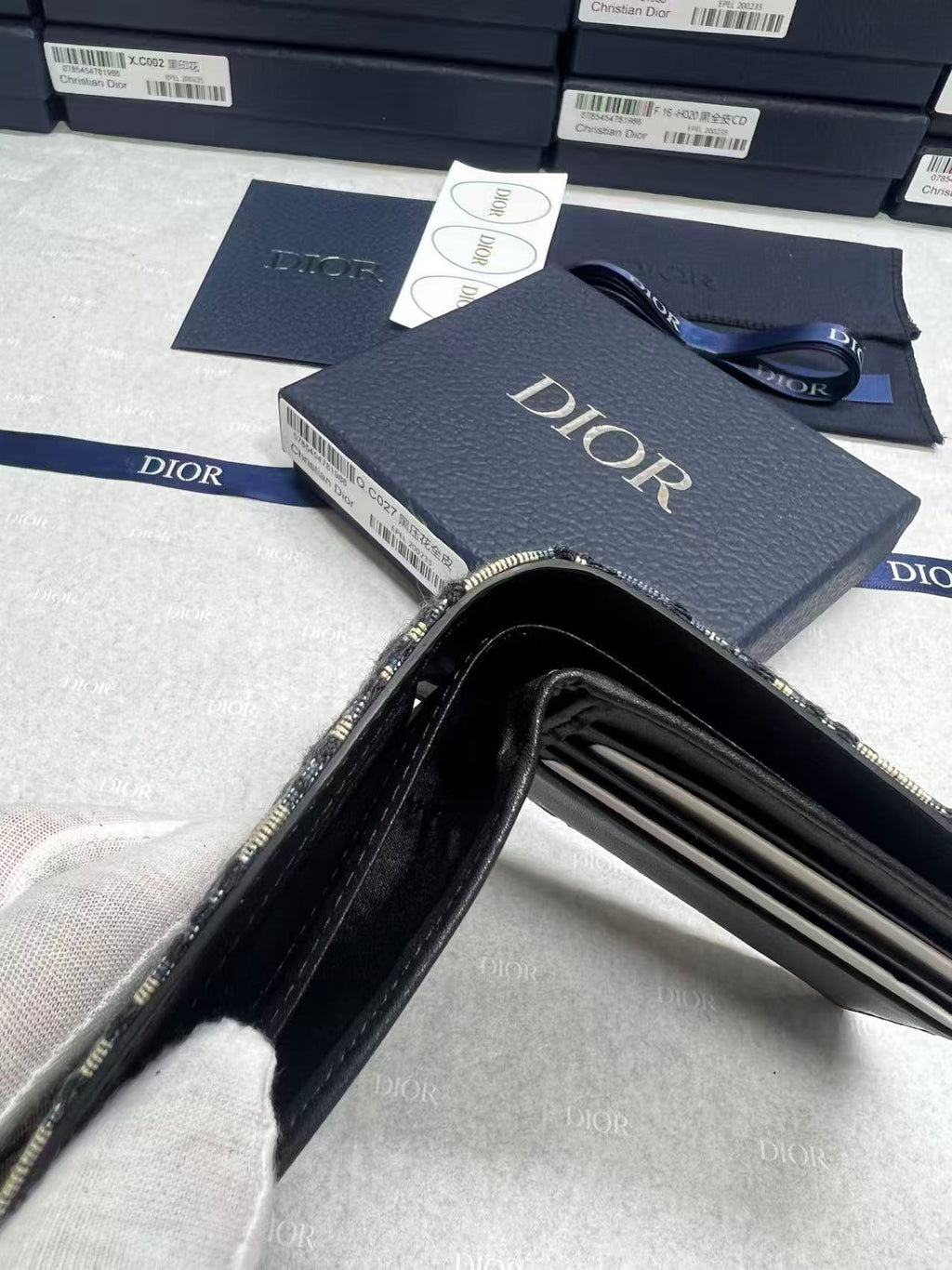 Small bag Dior monogram pouch open with black interior and zipper closure visible