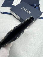 Small bag Dior monogram pouch open view, black interior lining and metal zipper trim