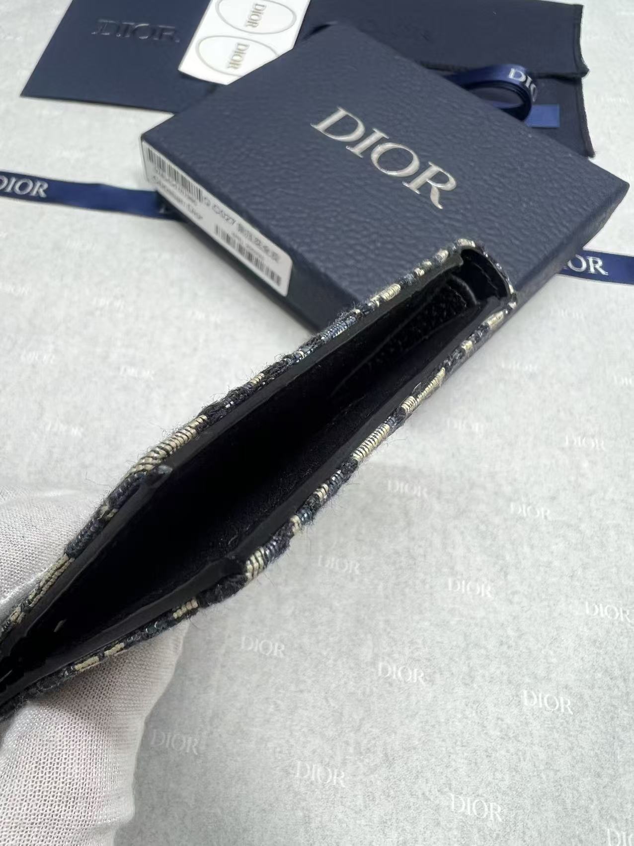 Small bag Dior monogram pouch open view, black interior lining and metal zipper trim