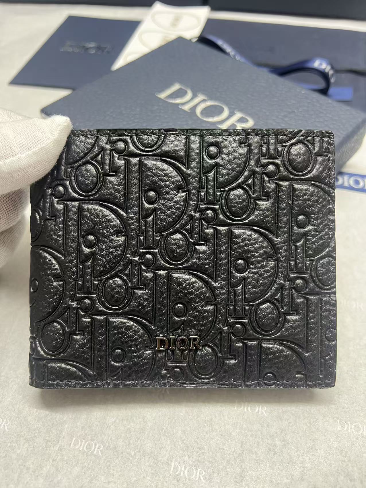 Small leather card holder with Dior embossed monogram texture, black front.