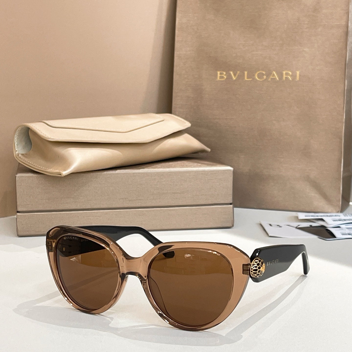 Bvlgari sunglasses with brown frames and brown lenses, cat-eye shape