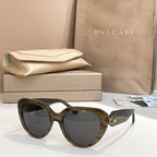 Bvlgari sunglasses with dark olive frames and dark lenses, cat-eye shape