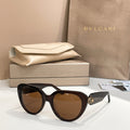 Bvlgari sunglasses with dark frames and brown lenses, cat-eye shape