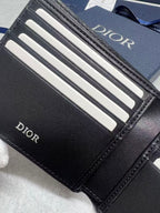 Small bag wallet front with Dior logo and multiple white card slots.