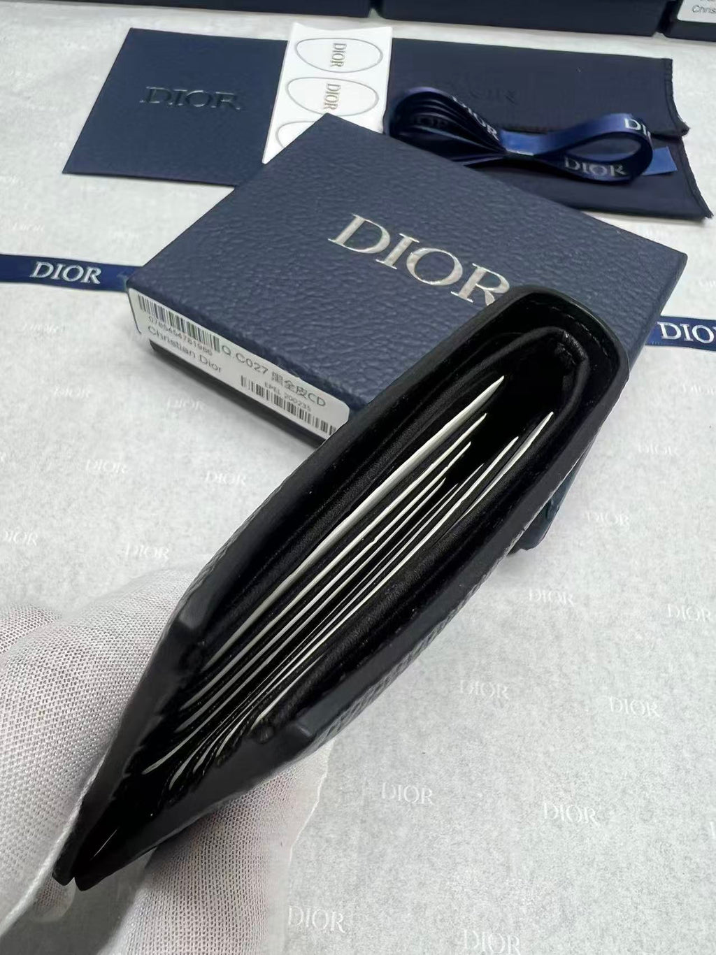 Small leather wallet, open view showing multiple interior card slots