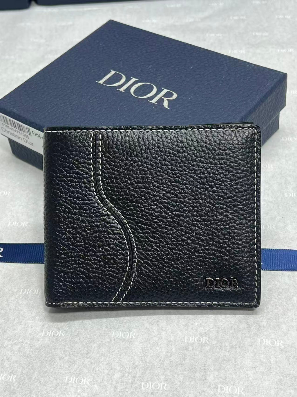 Black leather small wallet with Dior logo front and curved decorative seam