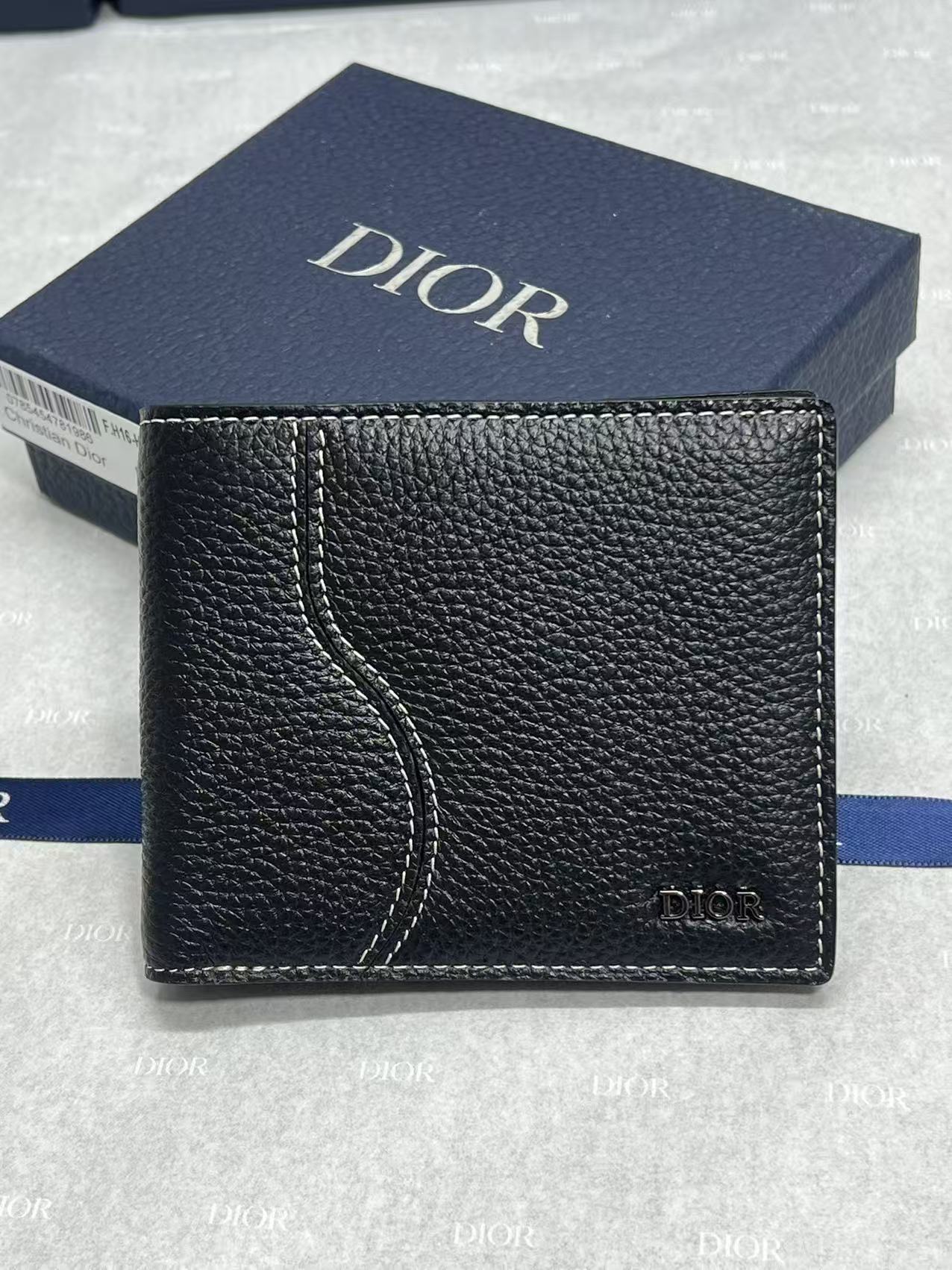 Black leather small wallet with Dior logo front and curved decorative seam