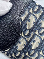 Small bag corner with navy Dior monogram jacquard and pebbled leather trim