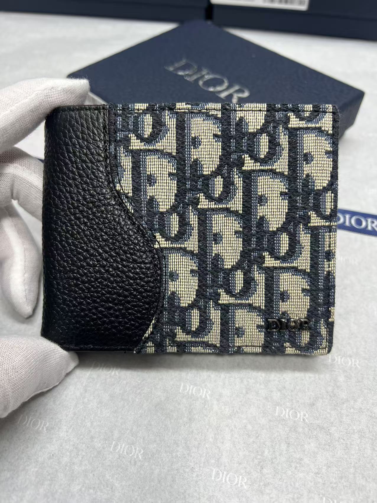 Small bag with black leather flap and Dior monogram jacquard front