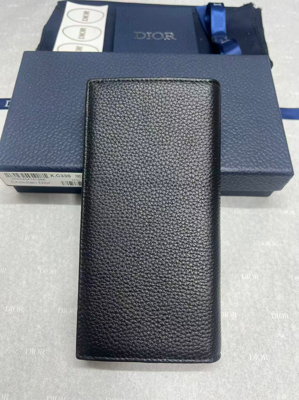 Dior bag in black pebbled leather, smooth rectangular front