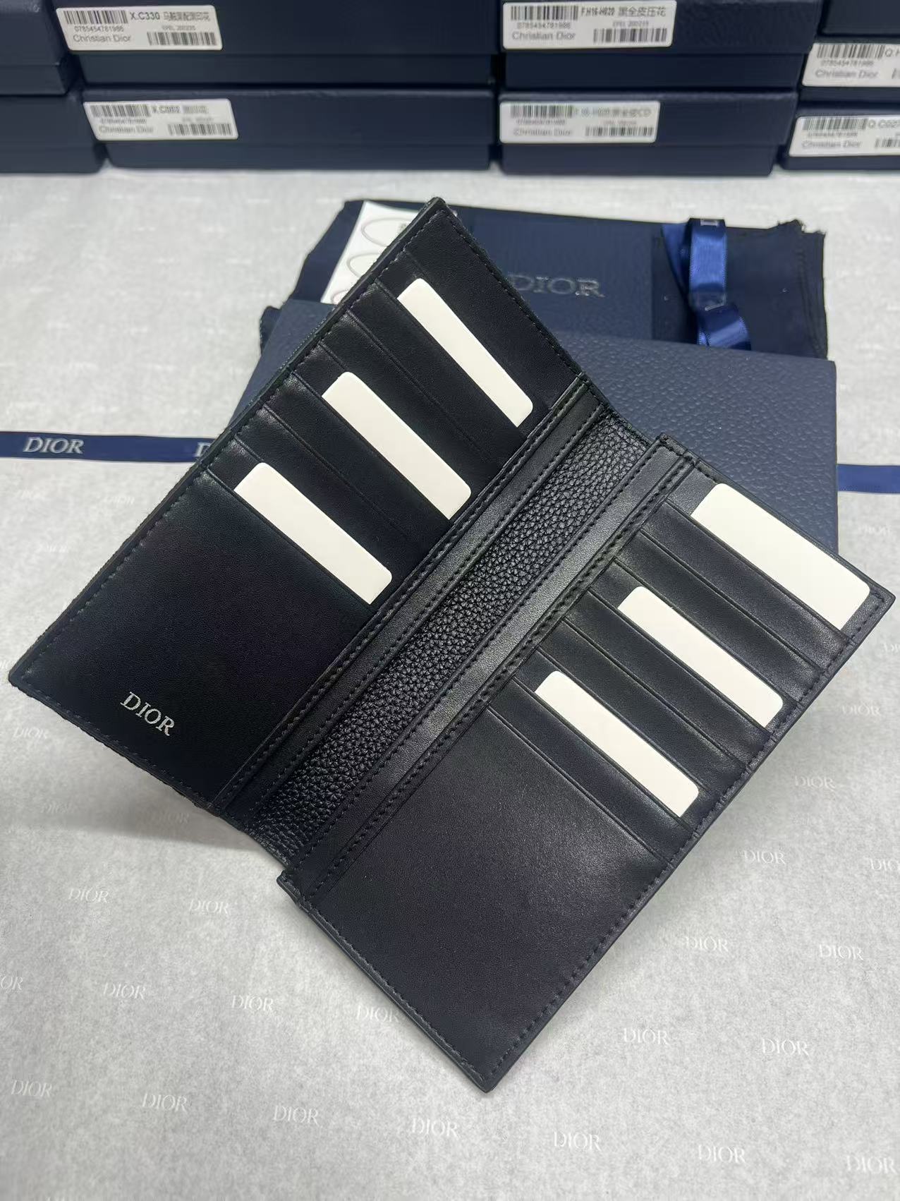 Dior small bag card holder with black textured leather and multiple slots