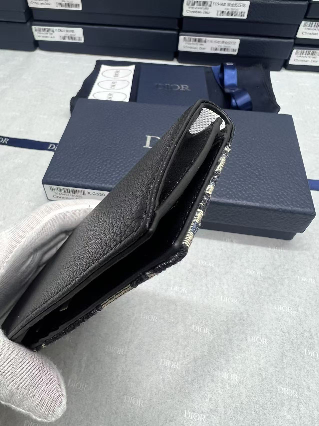 Leather wallet with flap opening and visible interior card slots