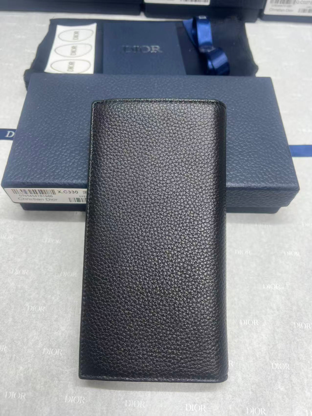 Leather wallet with dark pebbled-grain finish, slim rectangular profile