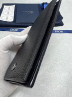 Dior small leather wallet, side view with metal snap detail