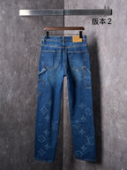 Louis Vuitton blue denim pants, front view with patch pockets and belt loops