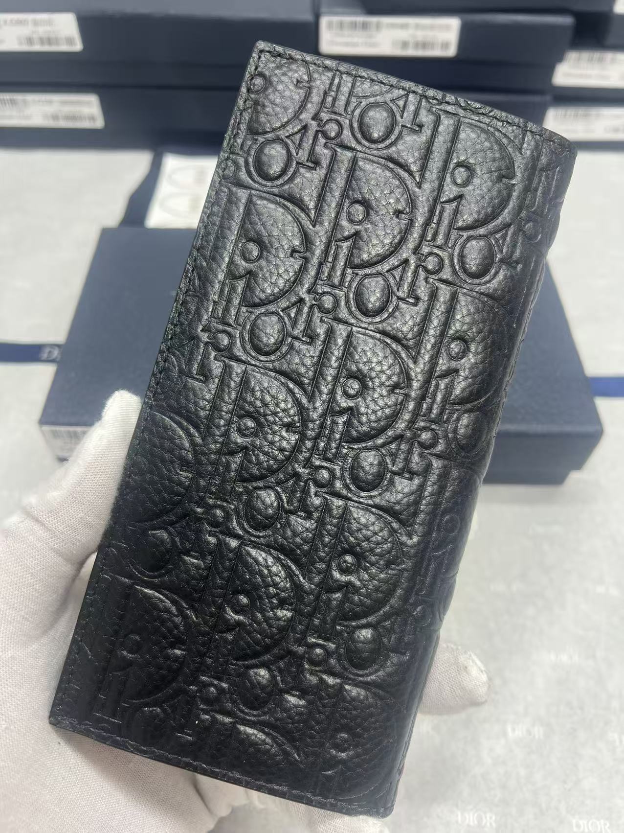 Dior small bag, dark embossed pattern on front panel