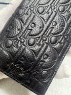 Dior small bag, dark leather with embossed monogram-style detail