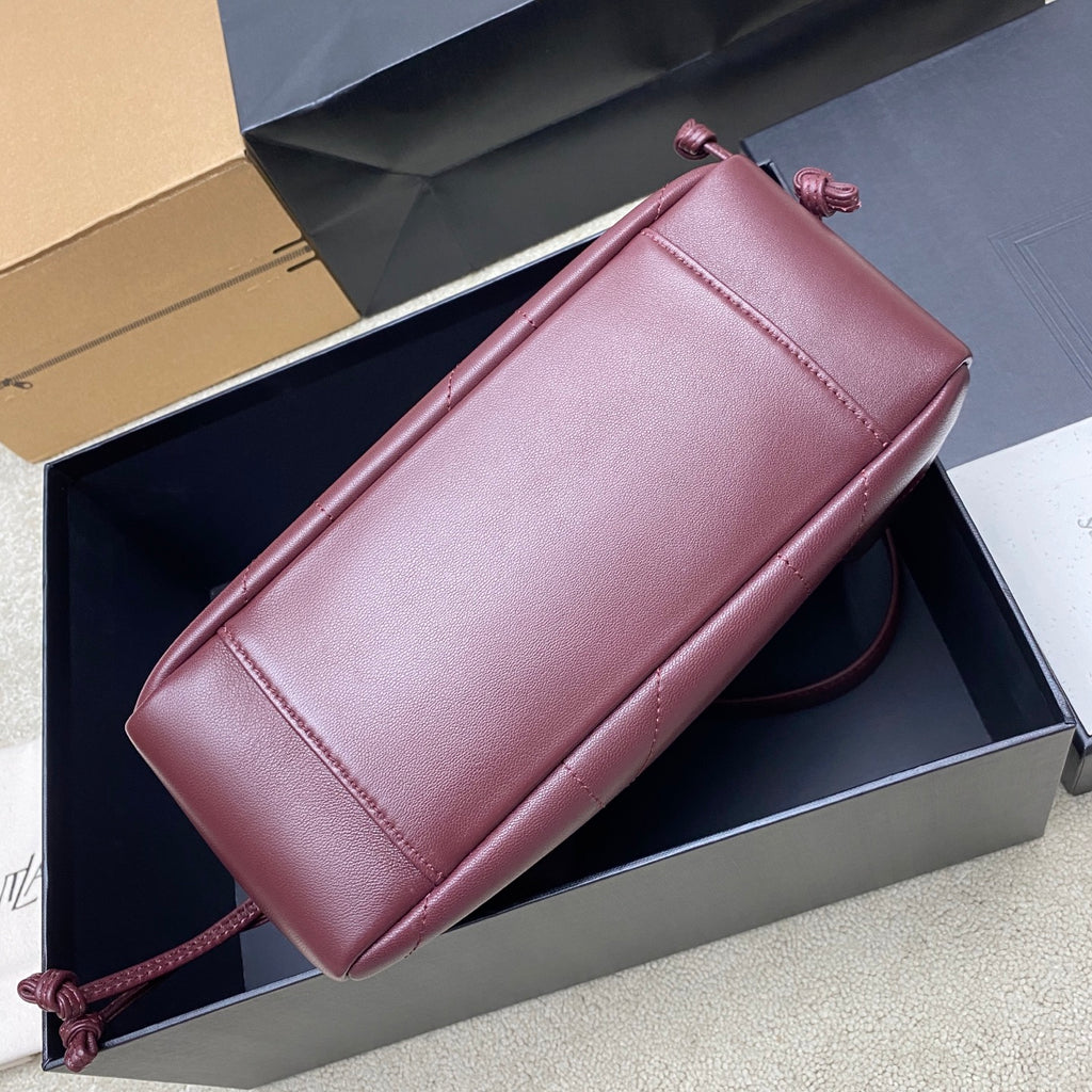 YSL pink leather clutch bag with stitched edge and gold-toned trim