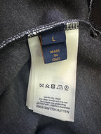 Hoodie care label showing "MADE IN ITALY" and cleaning instructions