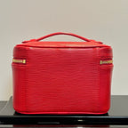 Louis Vuitton red cosmetic bag with top handle and stitched sides, gold zippers.