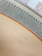 Louis Vuitton clutch bag interior leather trim with stitching and embossed branding