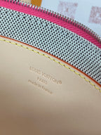 Interior label on Louis Vuitton pouch with Paris and Made in France text