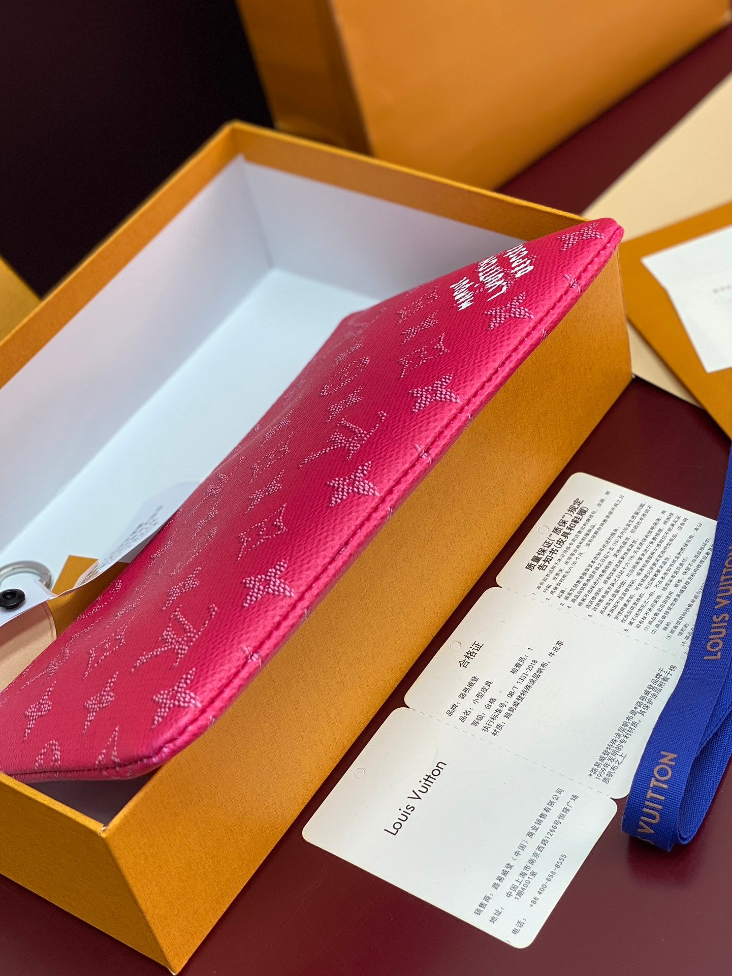 Louis Vuitton pink monogram zip pouch with printed logo and white tags