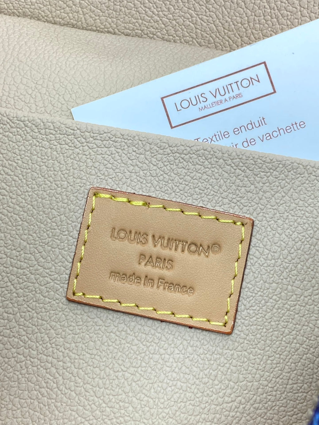 Louis Vuitton interior leather label patch in light beige