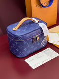 Louis Vuitton blue monogram vanity bag with tan handle and top zip closure