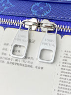 Louis Vuitton bag, white leather with blue zipper and silver clasp detail
