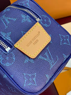 Louis Vuitton blue monogram toiletry bag, zip top and leather logo patch