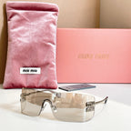 Miu Miu glasses with clear frame and amber tinted lenses