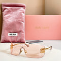 Miu Miu glasses with gold-tone frame and pale pink tinted lenses
